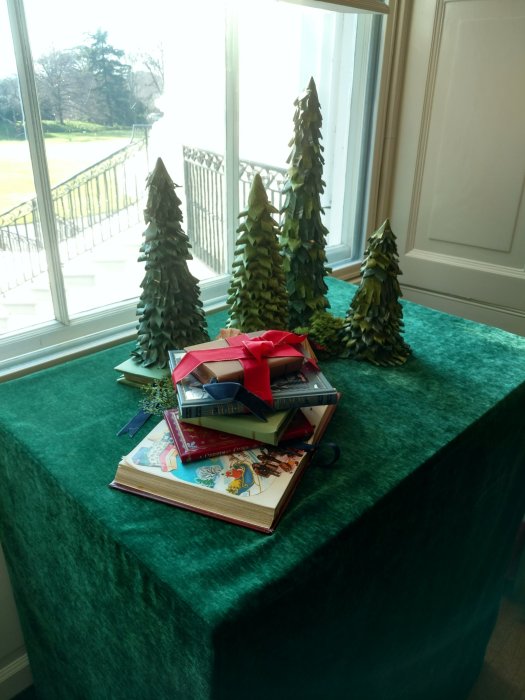 A Small Christmas display in front of a window at the White house