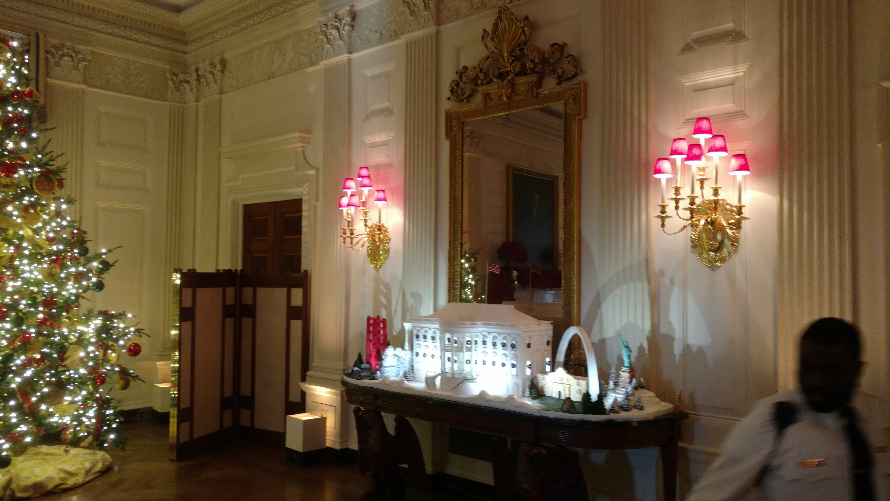 A model of the White House decorates a sideboard in the dining room at the White House.